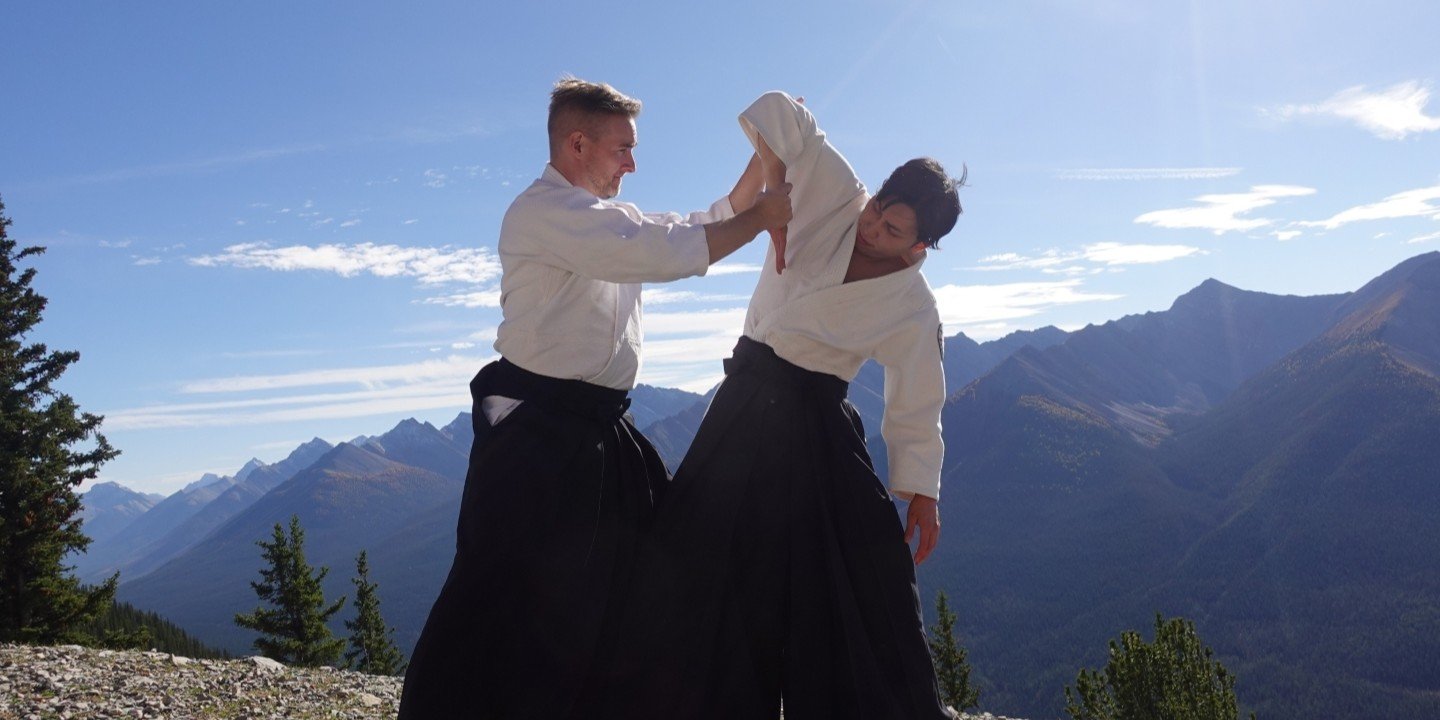 Aikidō students practicing ikkyo wrist control technique during class at Calgary Rakushinkan dojo.