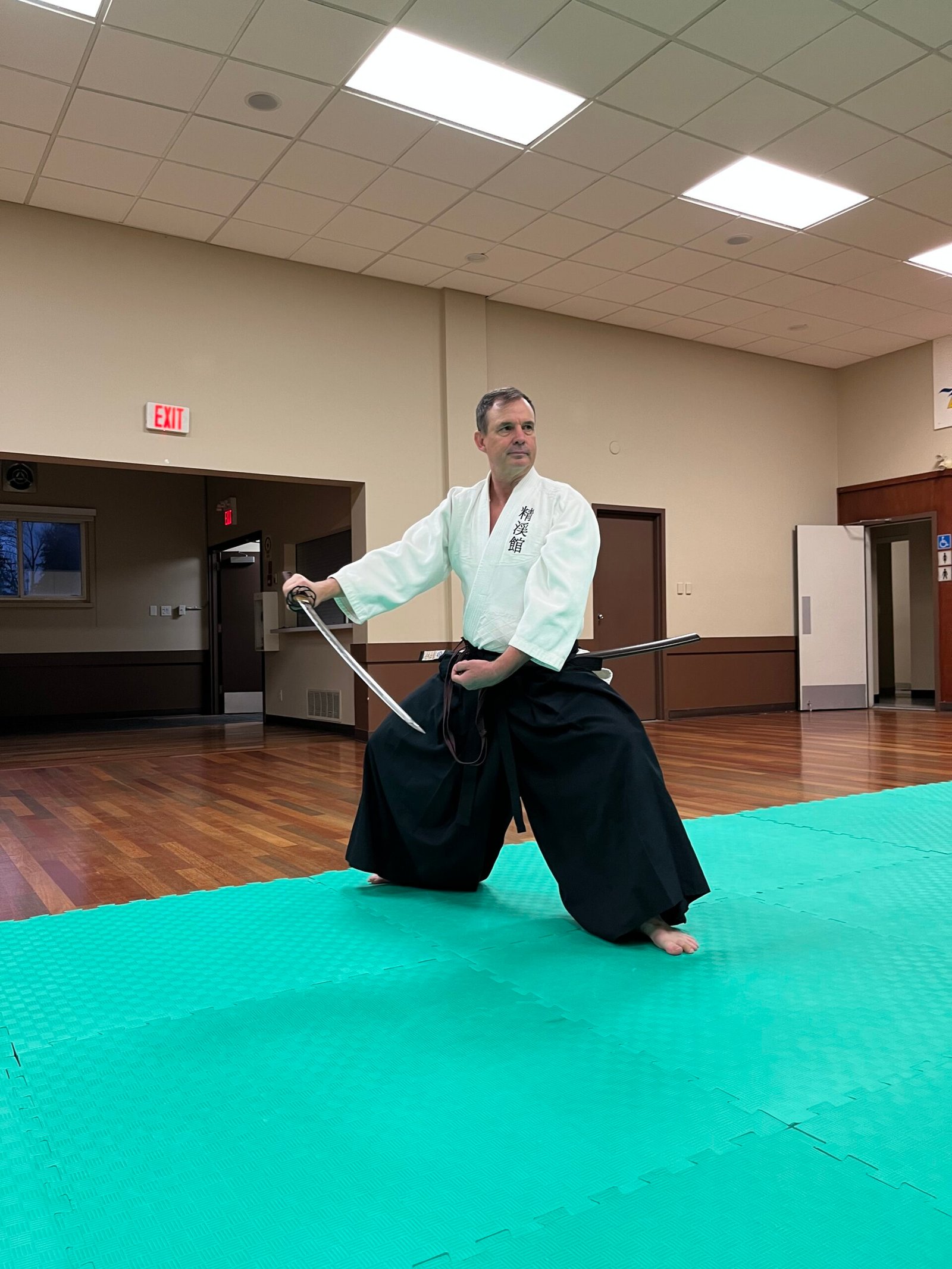 Mark Practicing iaijutsu in Mount Pleasant dojo